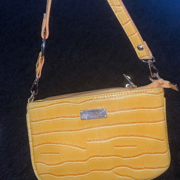 bebe Handbags - bebe yellow mini purse